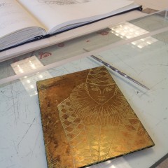 Etching the plate.
